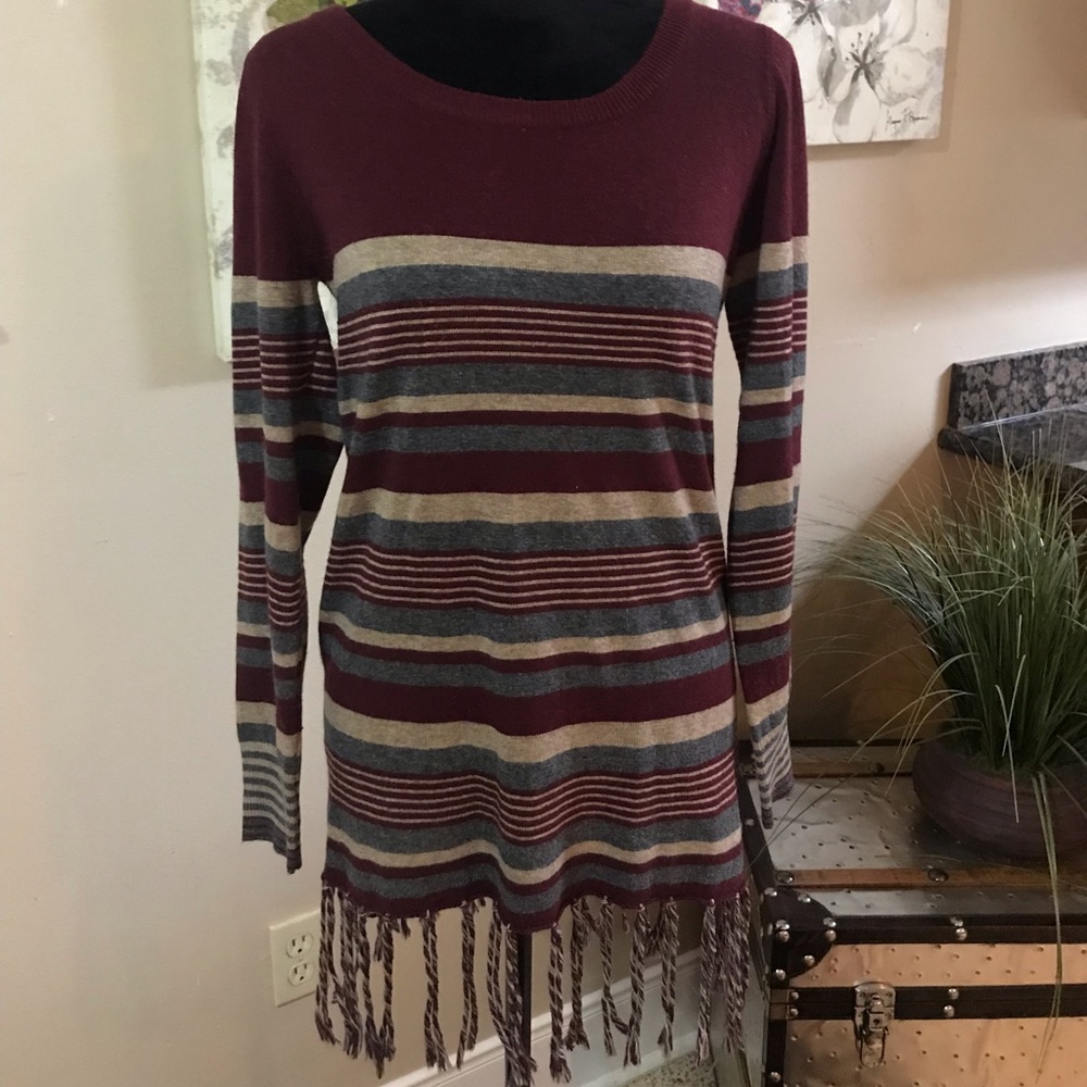 Striped sweater with fringes